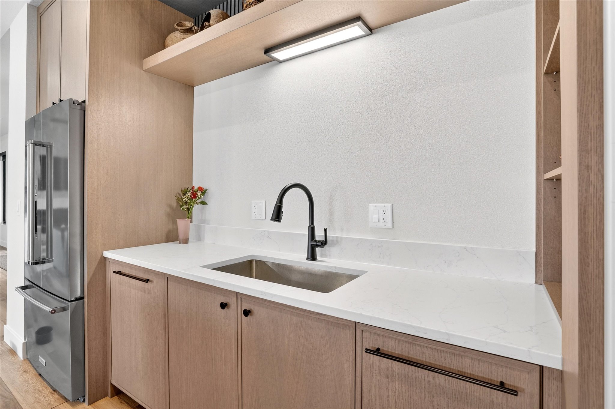 Custom cabinet hardware and finish detail