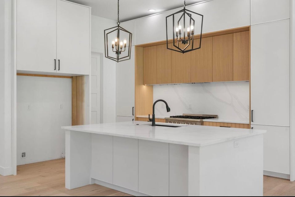 Modern white and oak custom kitchen cabinets